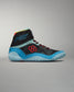 A modern black high-top athletic shoe with vibrant blue and red accents designed for performance and style