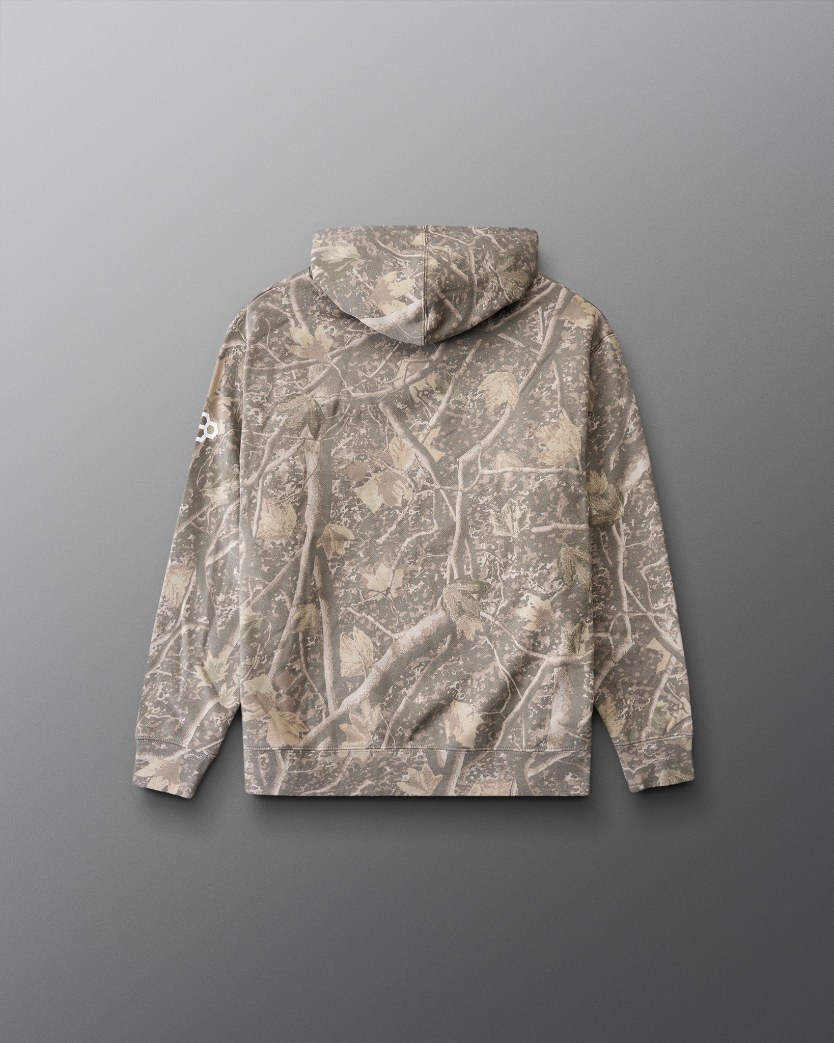 Camouflage-patterned hoodie on a gray background