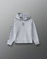 A light gray pullover hoodie with a black geometric logo on the center chest and vertical black lettering on one sleeve, displayed against a dark gray gradient background.