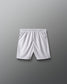 White athletic shorts on a gray background