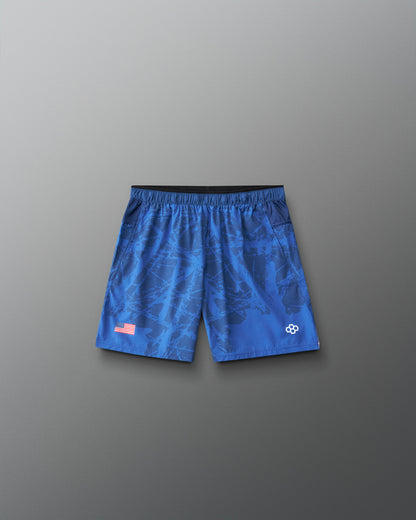 Front view of RUDIS Lacrosse Flag Boys 7" Attack Shorts in navy with tonal graphic print, American flag detail, and RUDIS logo.