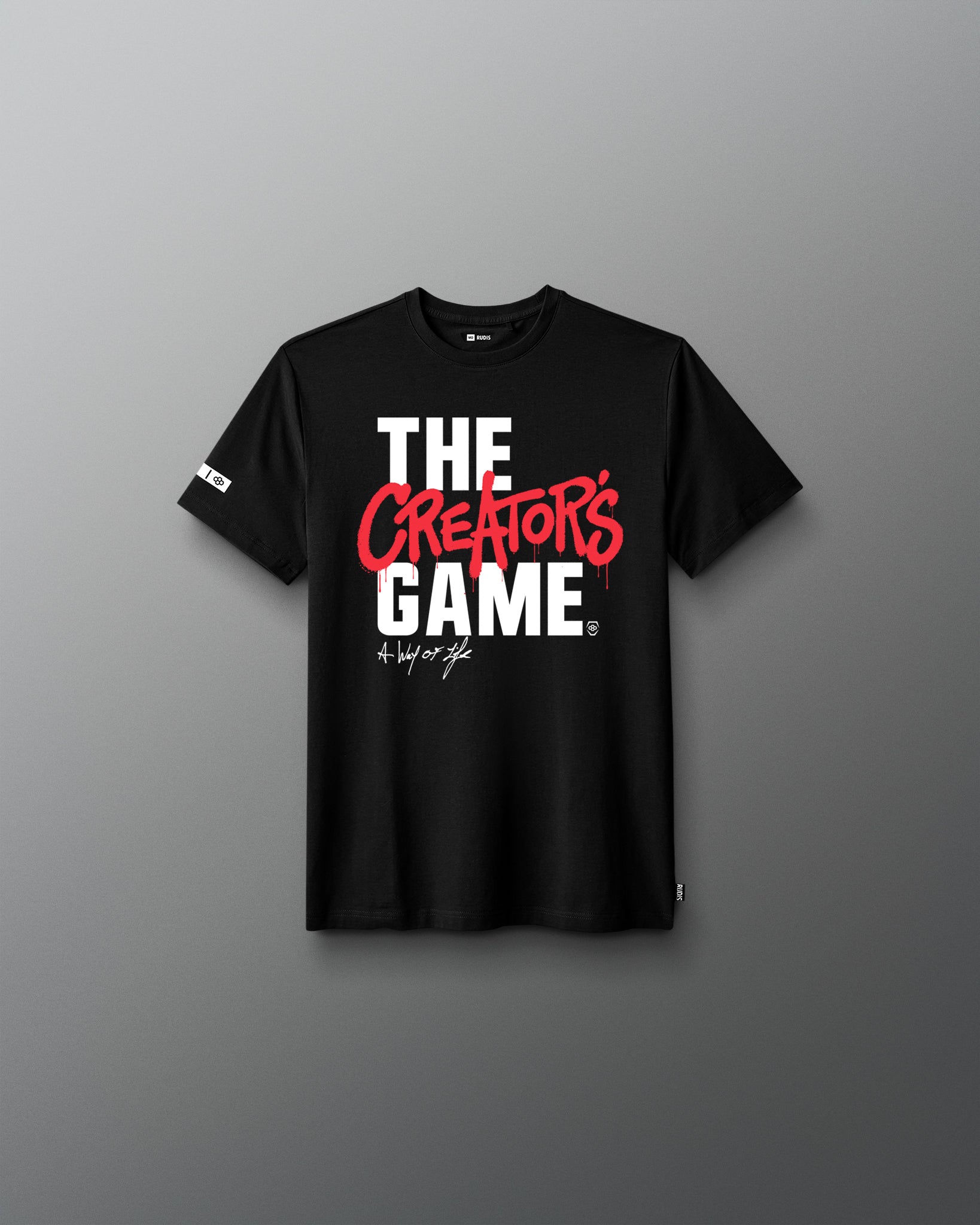 Black t-shirt with 'The Creator's Game' text on a gray background