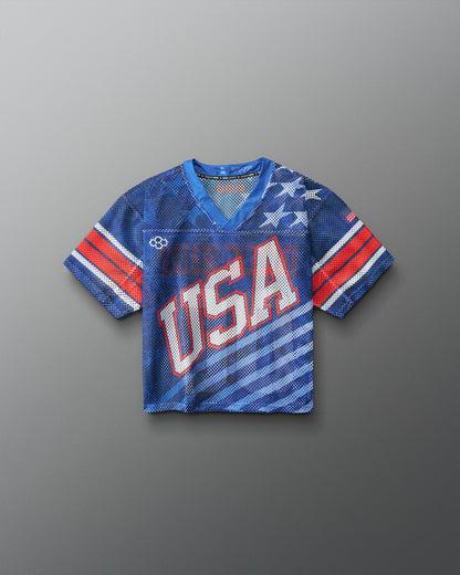 Front view of RUDIS Lacrosse Stars and Stripes Boys Throwback Porthole Jersey in navy mesh with white USA lettering and red, white, and blue graphics.