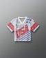 Front view of RUDIS Lacrosse Stars and Stripes Boys Throwback Porthole Jersey in white mesh with red USA lettering, blue stars, and striped graphics.