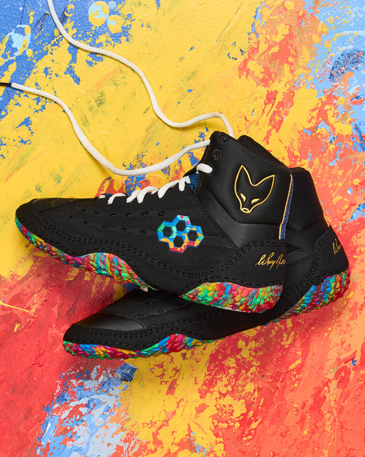 Colorful wrestling shoes with a multicolored sole on a multicolored background