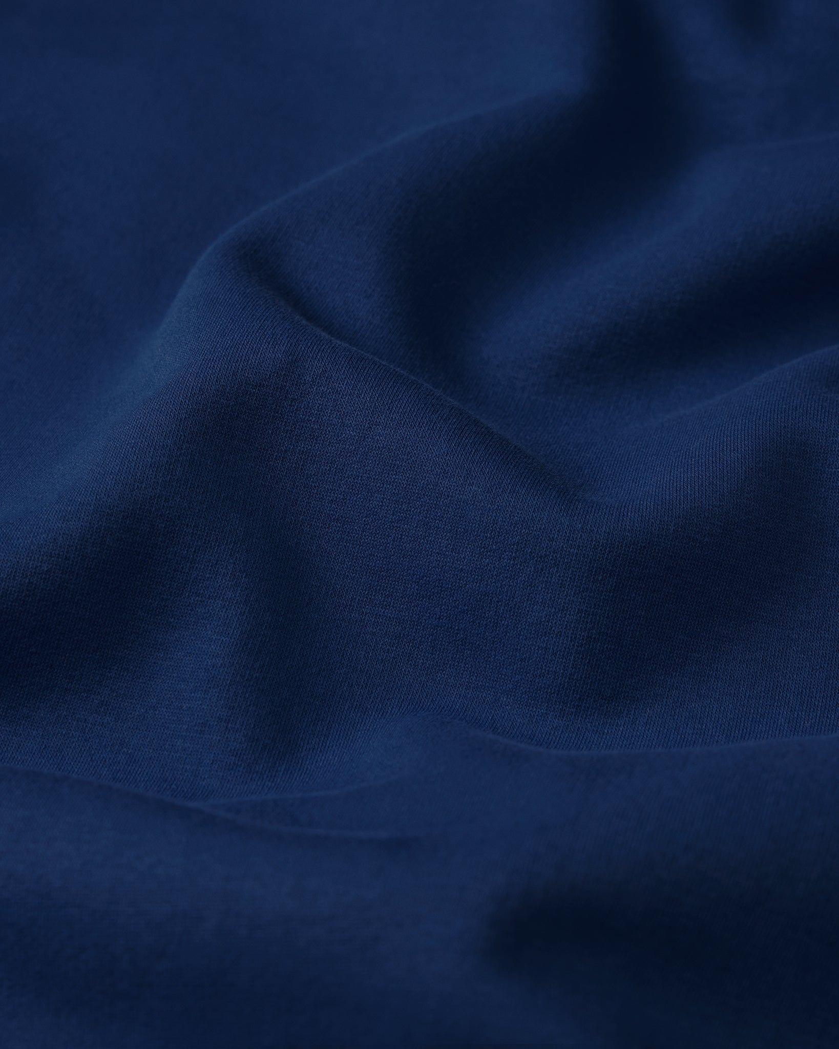 Close-up of dark blue fabric texture