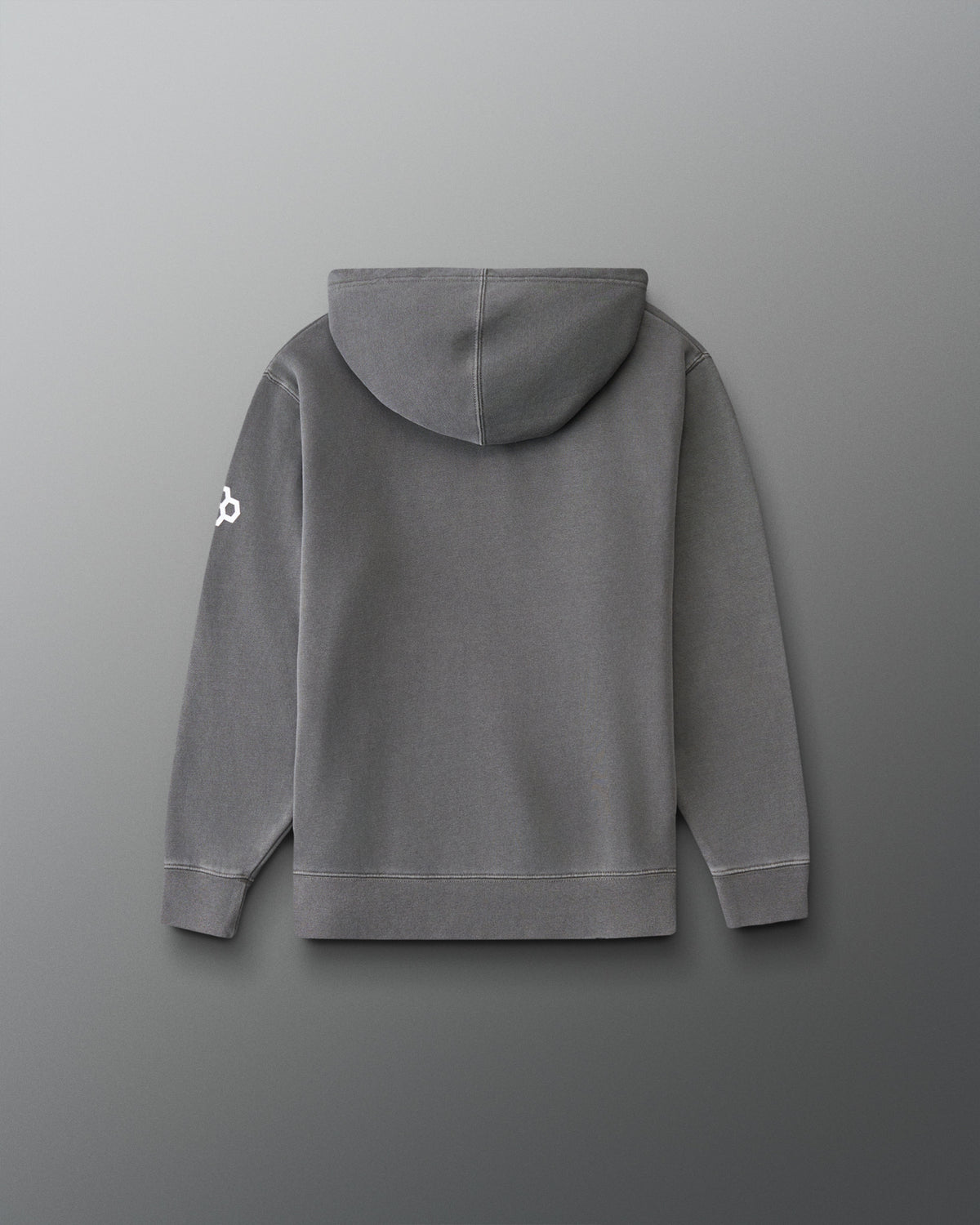A gray hooded sweatshirt shown from the back, featuring a small white logo on the left sleeve, set against a dark gray gradient background.