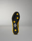 Black and yellow wrestling shoes sole with a brand logo on a gray background