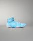 Light blue wrestling shoe with white sole on a gray background
