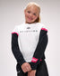 Young girl wearing a wrestling-themed sweatshirt with visible branding on a plain background