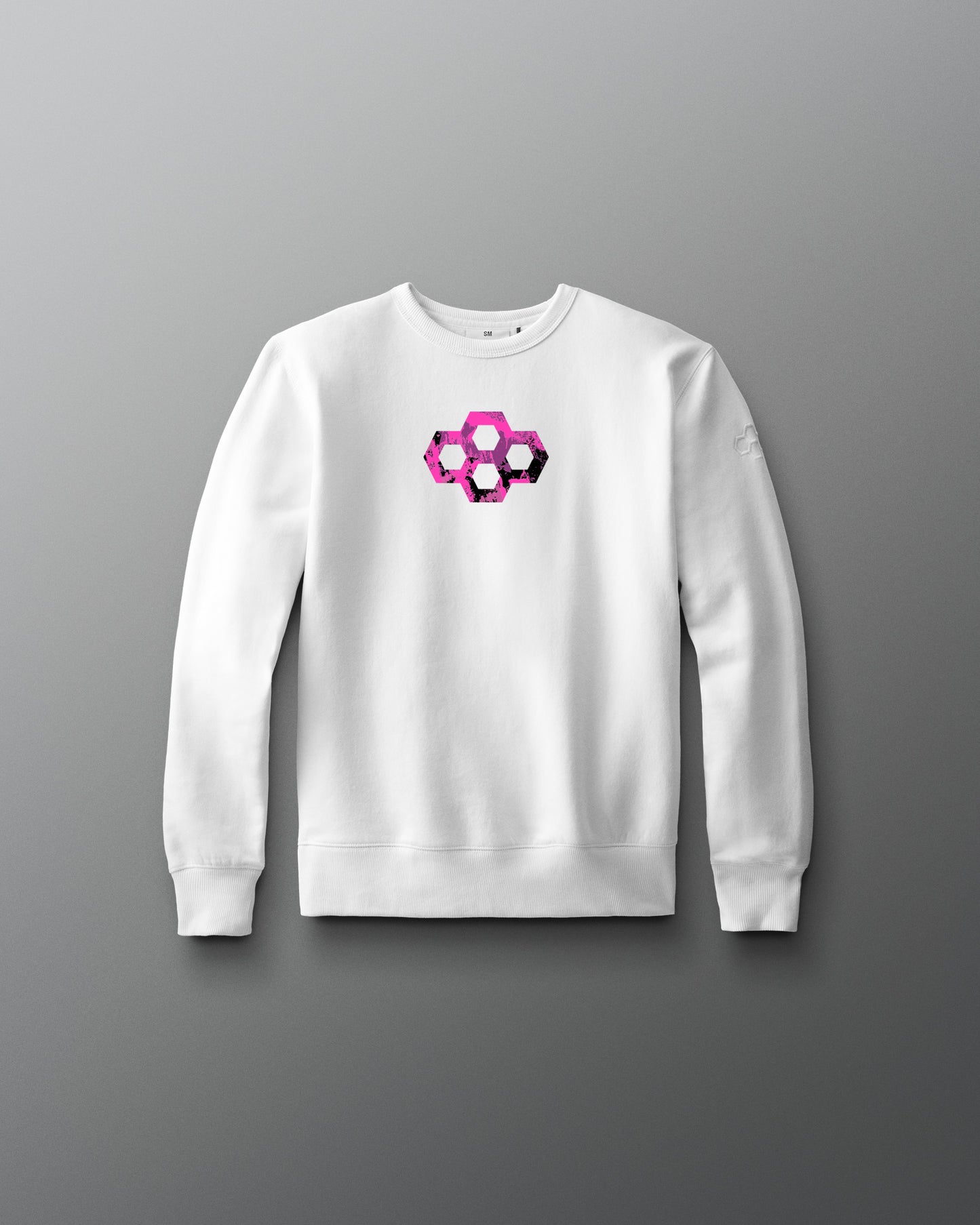 White sweatshirt with a geometric pink and purple design on a gray background