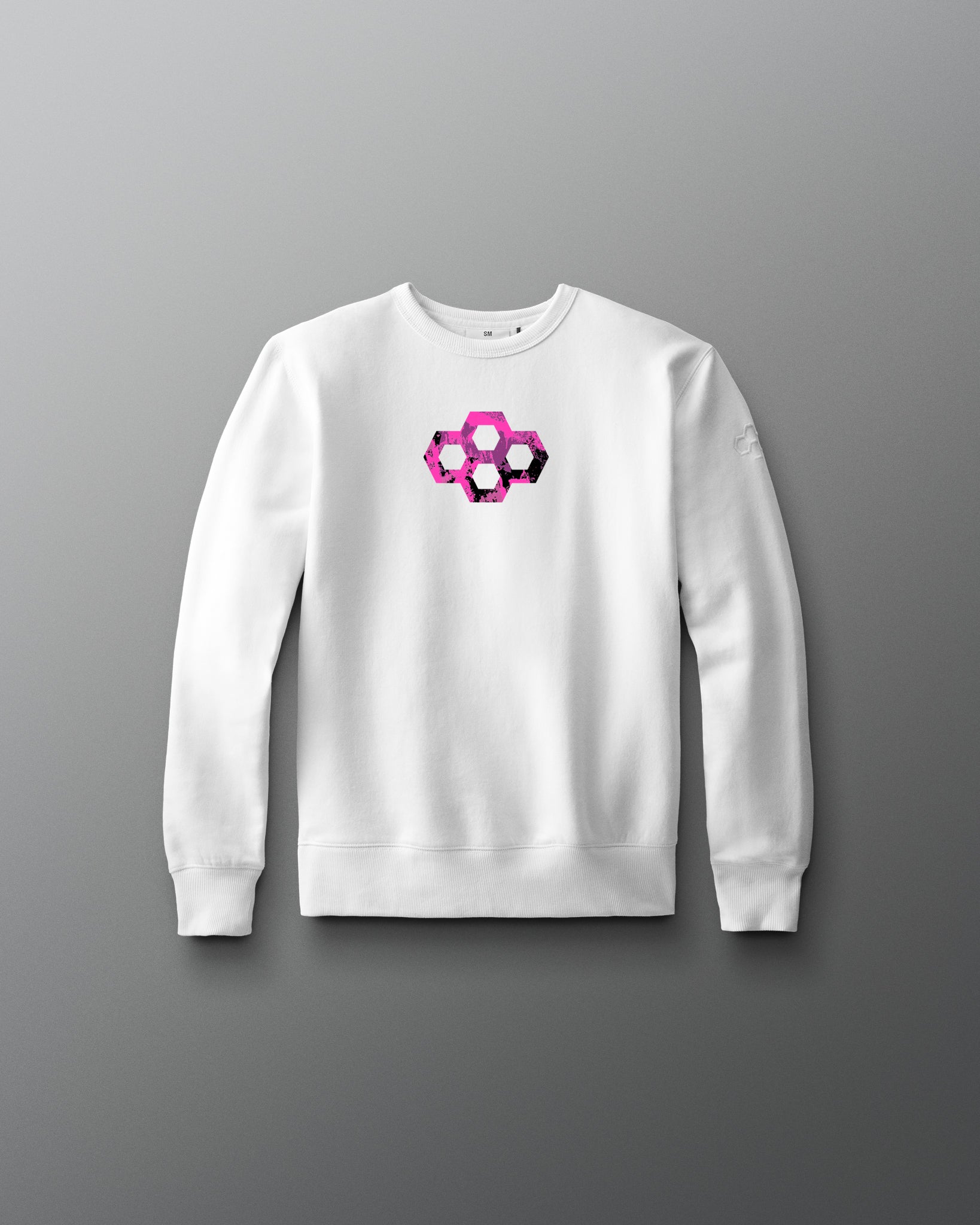 White sweatshirt with a geometric pink and purple design on a gray background