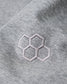 Gray fabric with embroidered hexagonal pattern