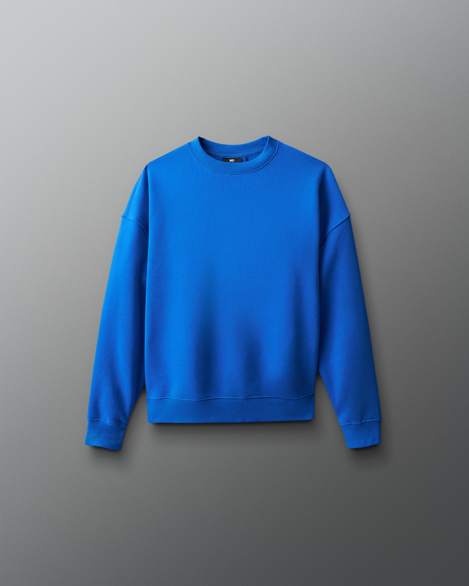 Royal Blue sweatshirt on a gray background