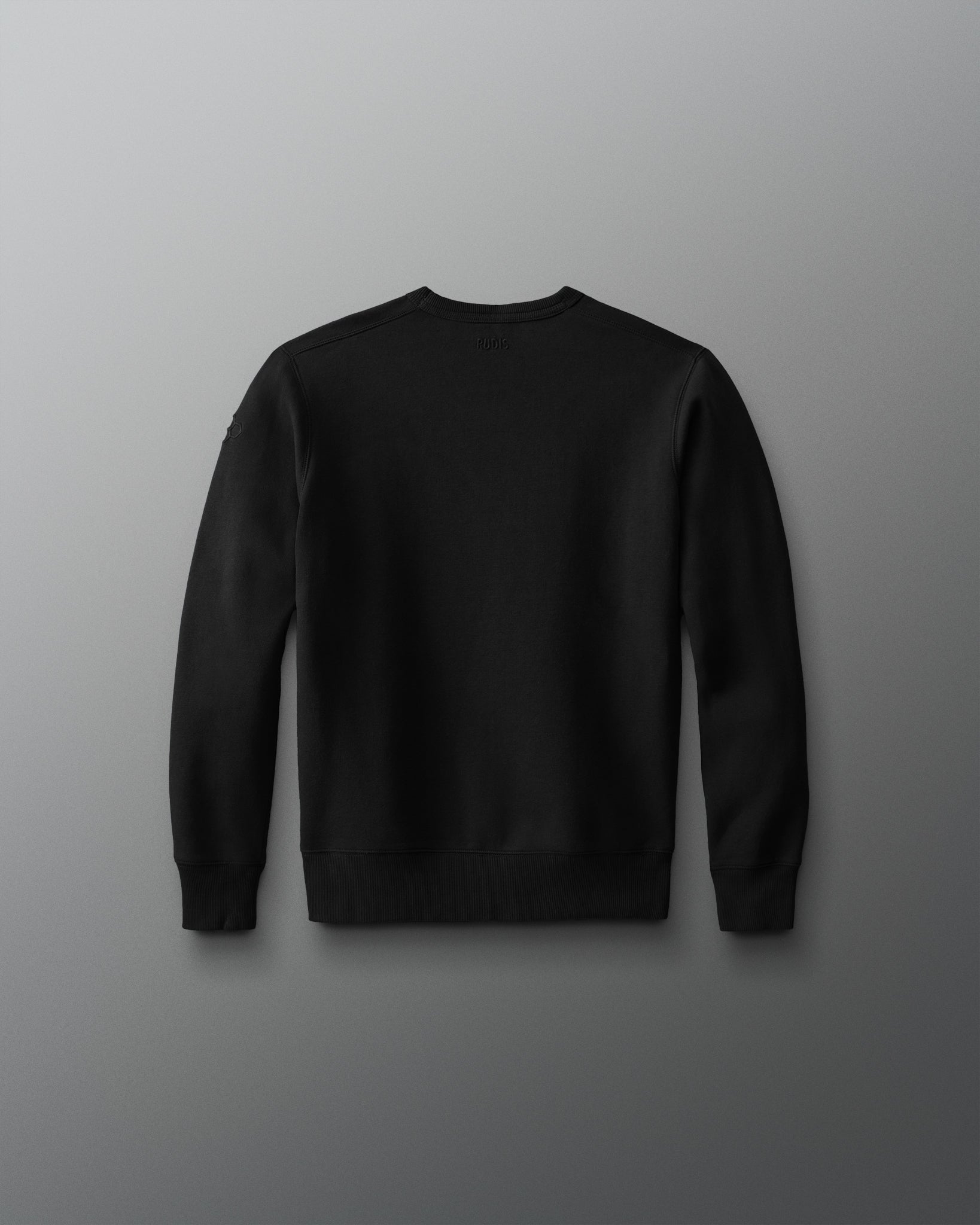 Black sweatshirt on a gray background