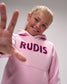 Person wearing a pink hoodie with 'RUDIS' branding, making a peace sign.