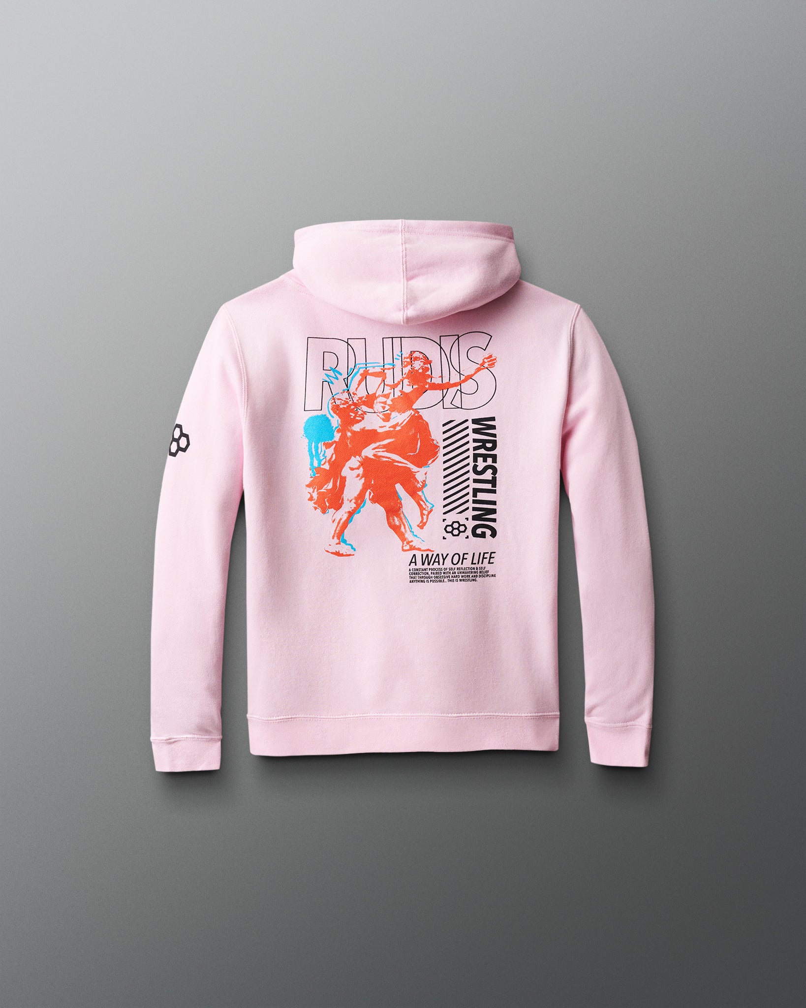 Pink hoodie with graphic design on the back against a gray background with wrestling words in black