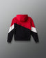 Color-blocked hoodie with red, white, and black design on a gray background