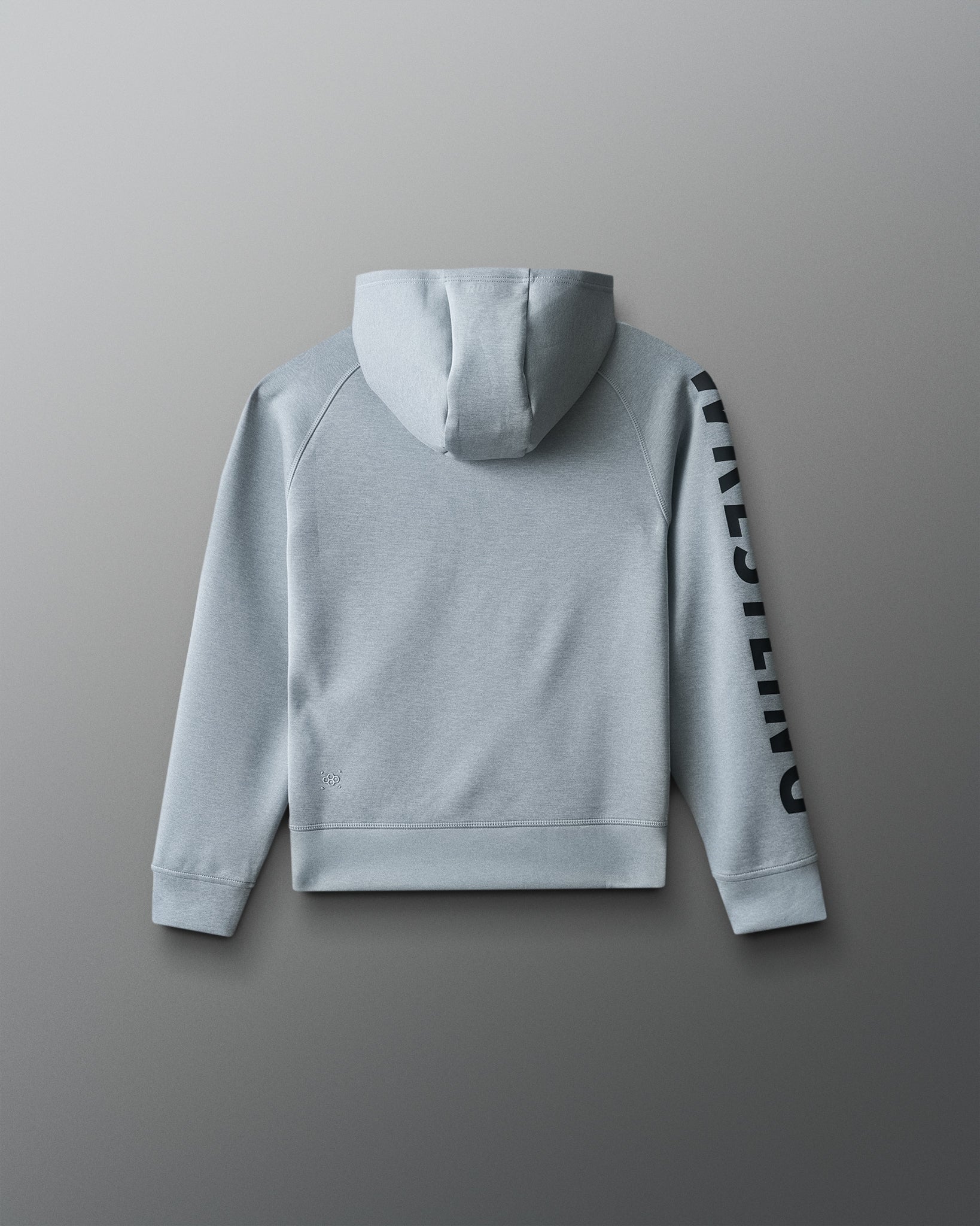 Gray hoodie with a brand logo on the sleeve against a gray background