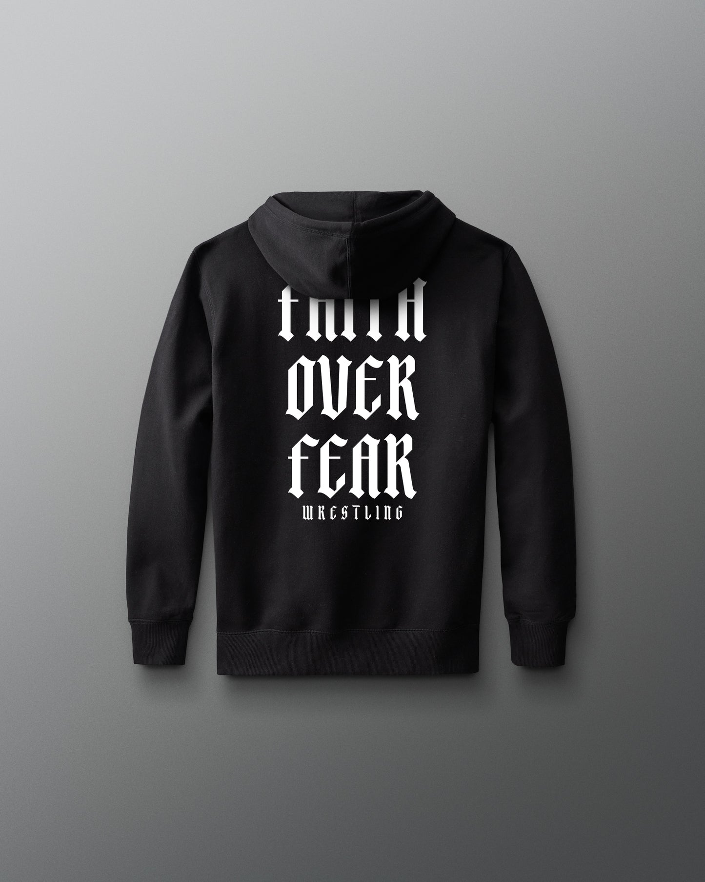 Black hoodie with white text on the back against a gray background