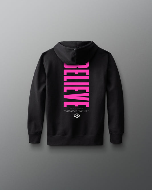 Black hoodie with pink 'BELIEVE' text on the back against a gray background