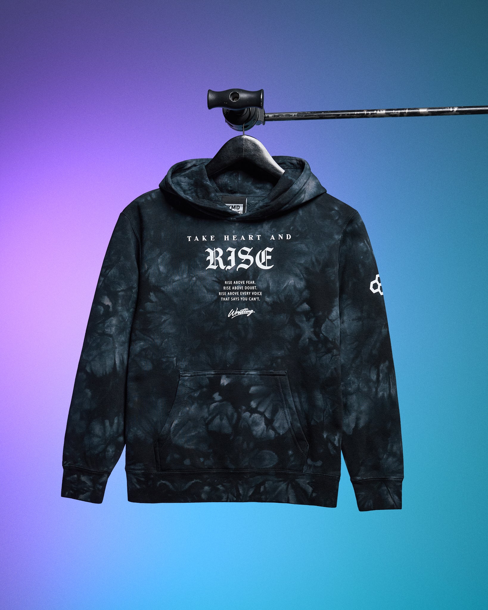 Black tie-dye hoodie with text on a hanger against a gradient background