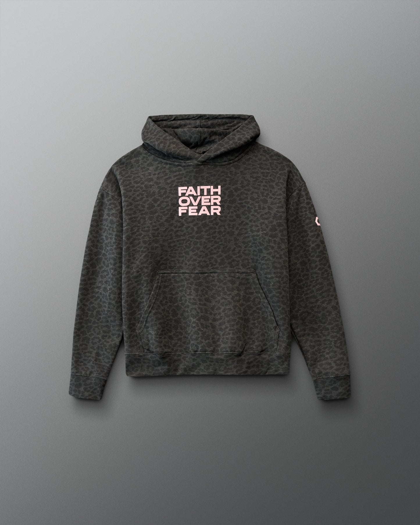 Gray hoodie with 'Faith Over Fear' text on a gray background