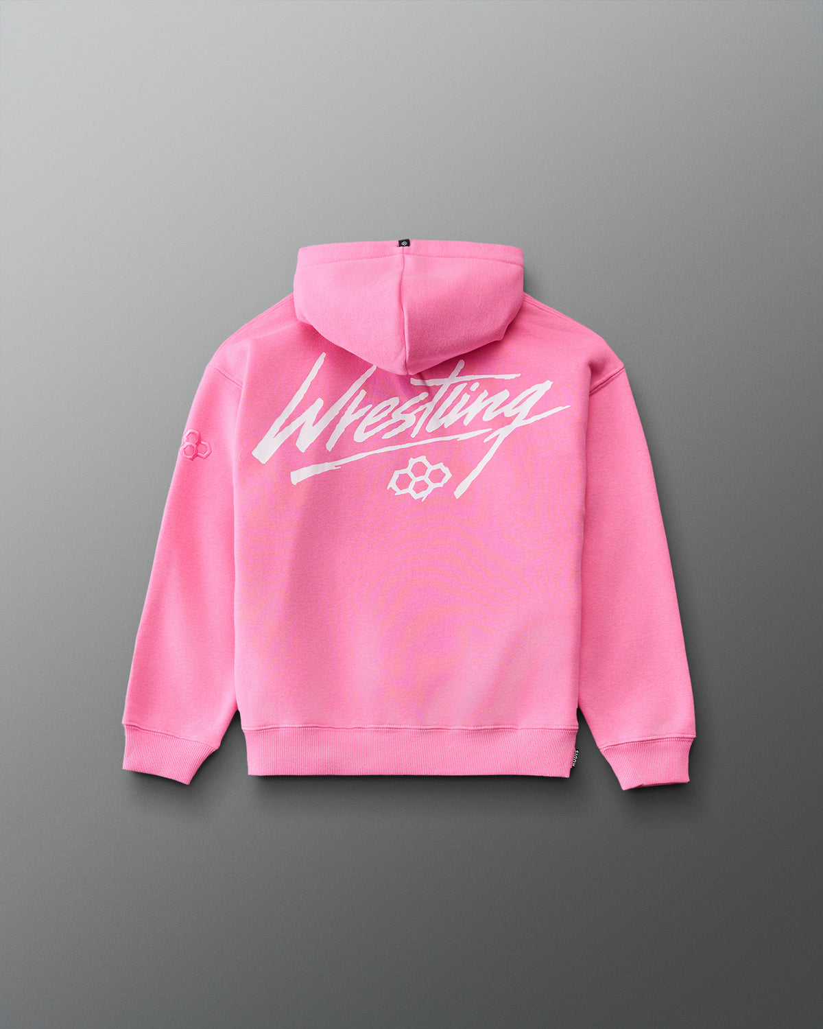 RUDIS Art of Wrestling Youth Relaxed Comfort Fleece Hoodie in Bubble Gum Pink, back view featuring oversized white Wrestling script, RUDIS logo, and ribbed hem. Copy Alt Text