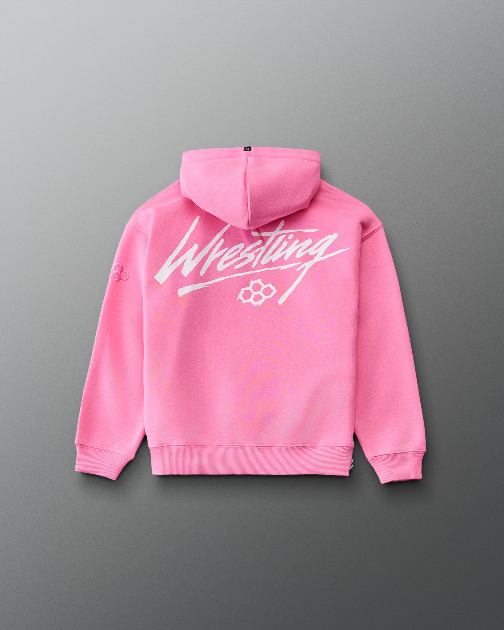 RUDIS Art of Wrestling Youth Relaxed Comfort Fleece Hoodie in Bubble Gum Pink, back view featuring oversized white Wrestling script, RUDIS logo, and ribbed hem. Copy Alt Text