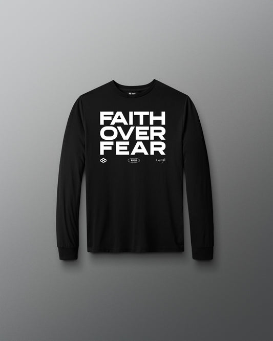 Black long-sleeve shirt with 'Faith Over Fear' text on a gray background