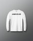 White long-sleeve shirt with 'A Way of Life' text on a gray background