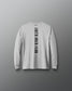 A light gray heather long-sleeve t-shirt shown from the back, featuring the text 'FAITH OVER FEAR' printed vertically in black on the center back.