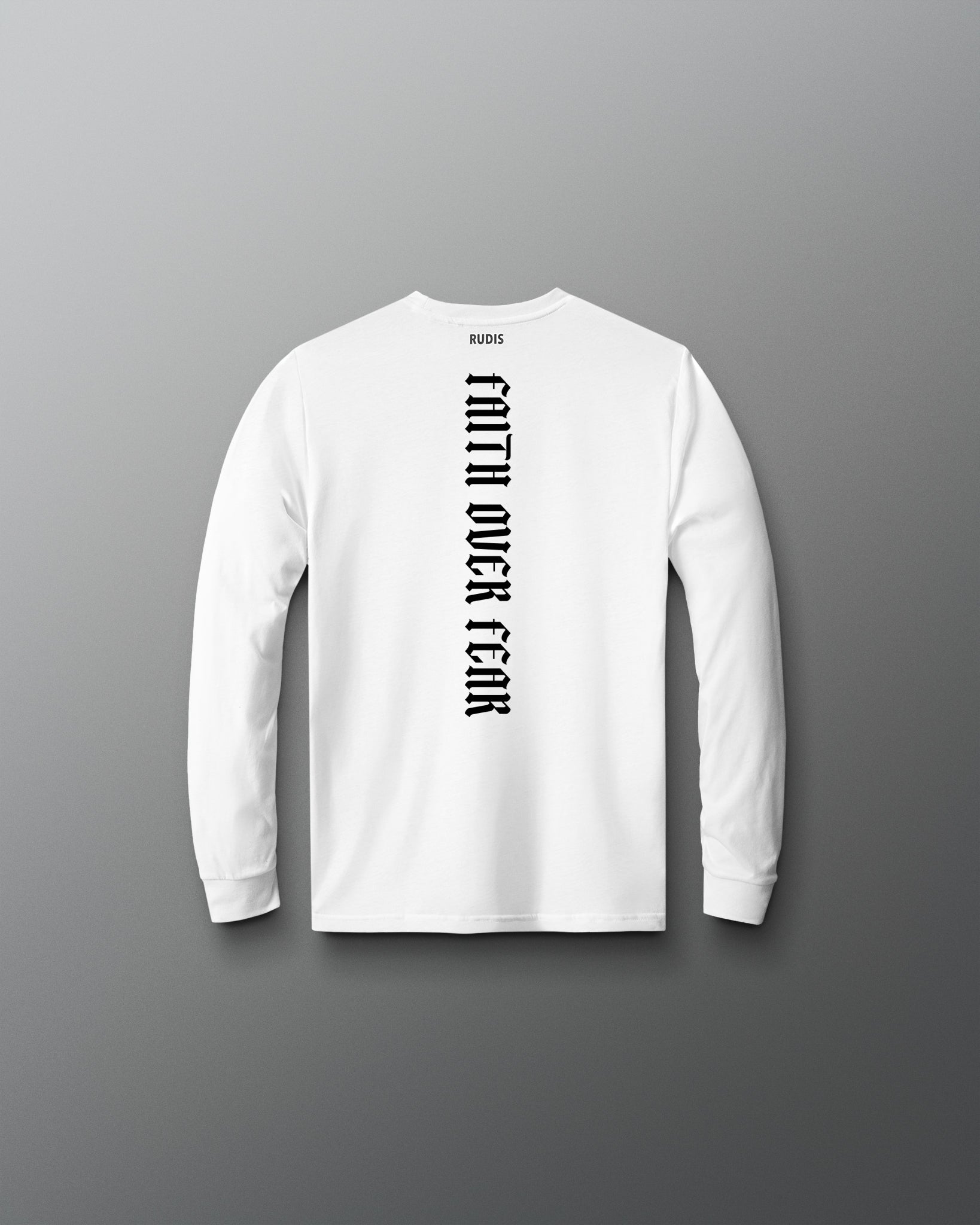 A white long-sleeve t-shirt with 'FAITH OVER FEAR' printed vertically in black on the back, displayed against a dark gray gradient background.
