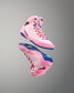 Pink and blue wrestling shoe on a gray background