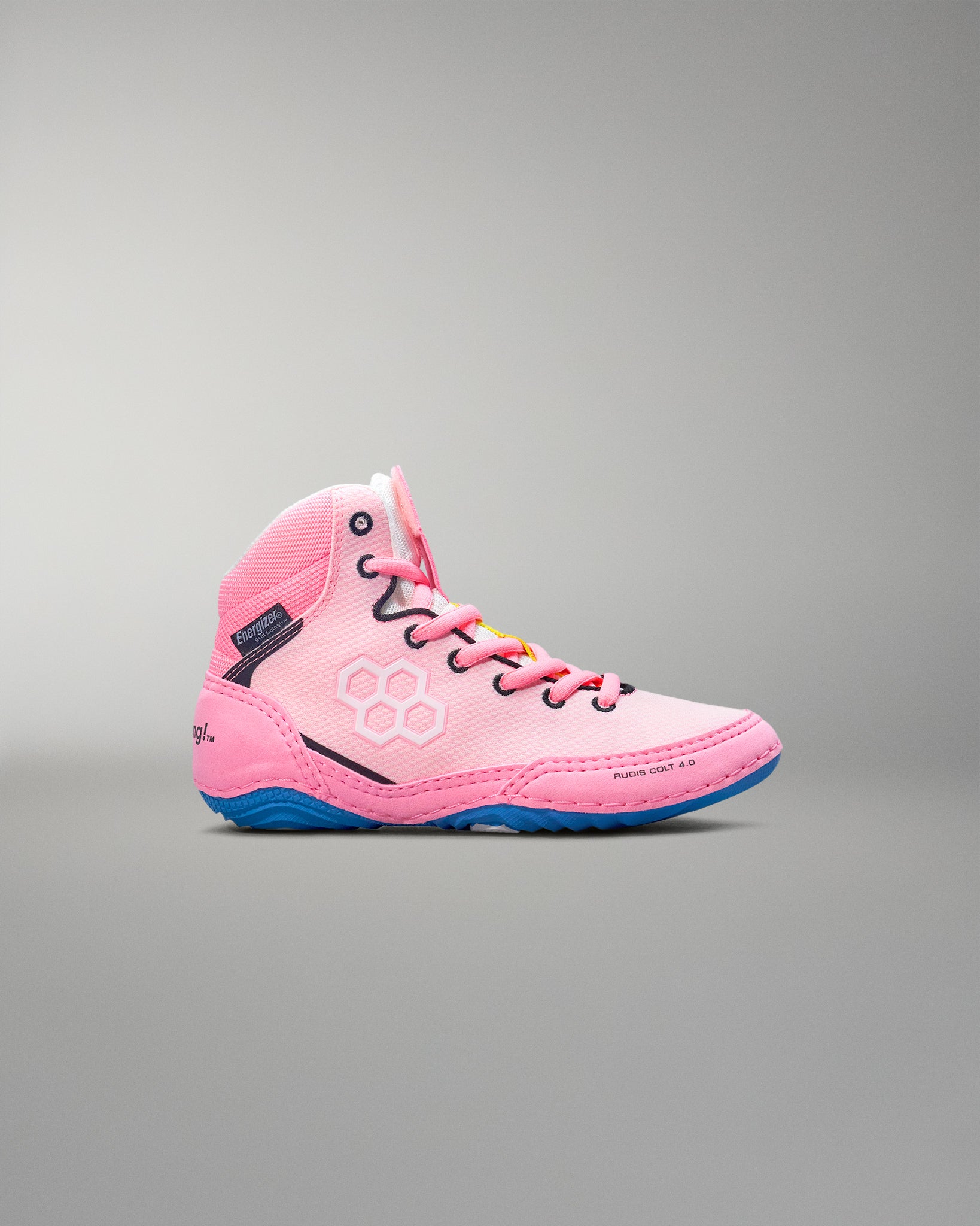 Pink wrestling shoe with blue sole on a gray background