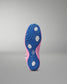 Close-up of a pink and blue wrestling shoe sole on a gray background