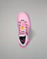 Pink wrestling shoe with colorful sole on a gray background