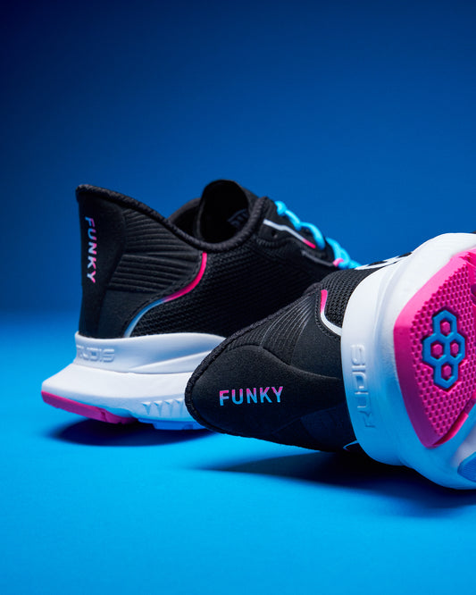 Black and pink sneakers with 'Funky' branding on a blue background