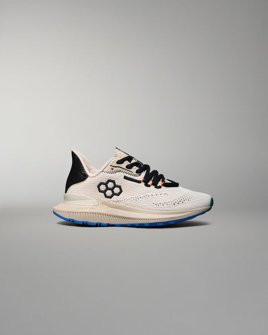 White running shoe with black accents on a gray background