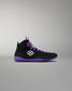 Black high-top sneaker with purple accents on a gray background