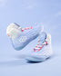 Light blue wrestling shoes with colorful laces on a light blue background