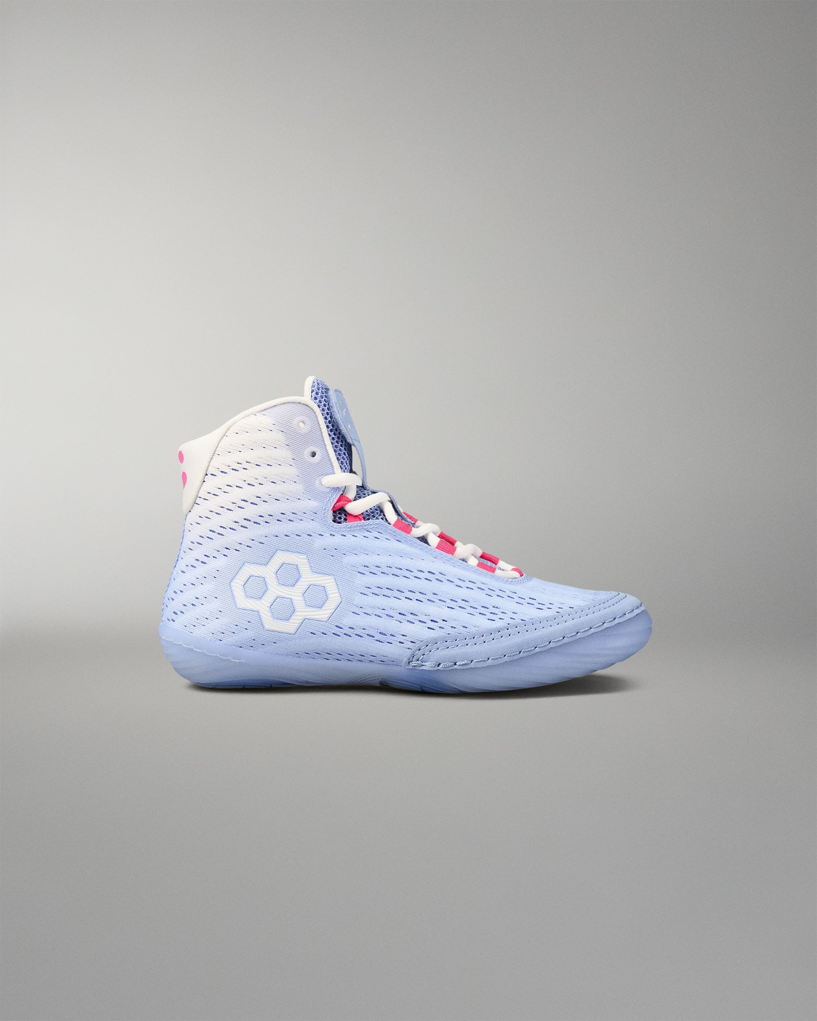 Blue wrestling shoe with white sole on a gray background