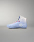Blue wrestling shoe with a white logo on a gray background