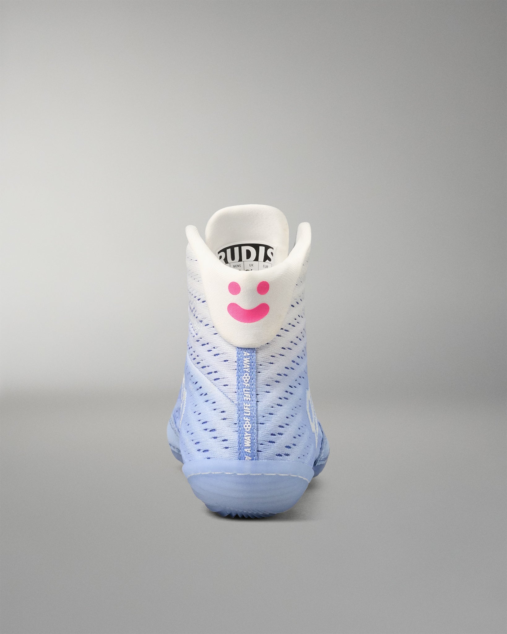 Blue wrestling shoe with a smiley face design on a gray background