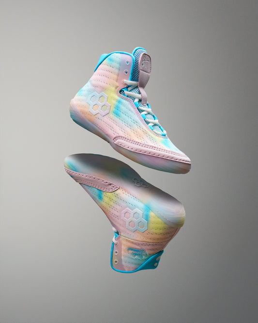 Colorful Wrestling shoes with a gradient design on a gray background