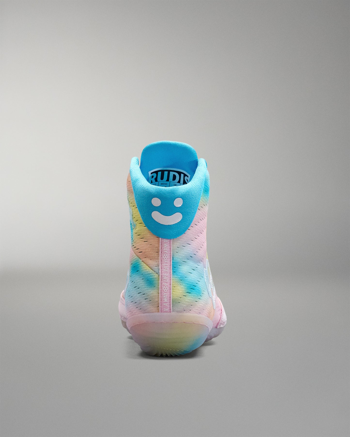 Colorful Wrestling shoe with a smiley face design on a gray background