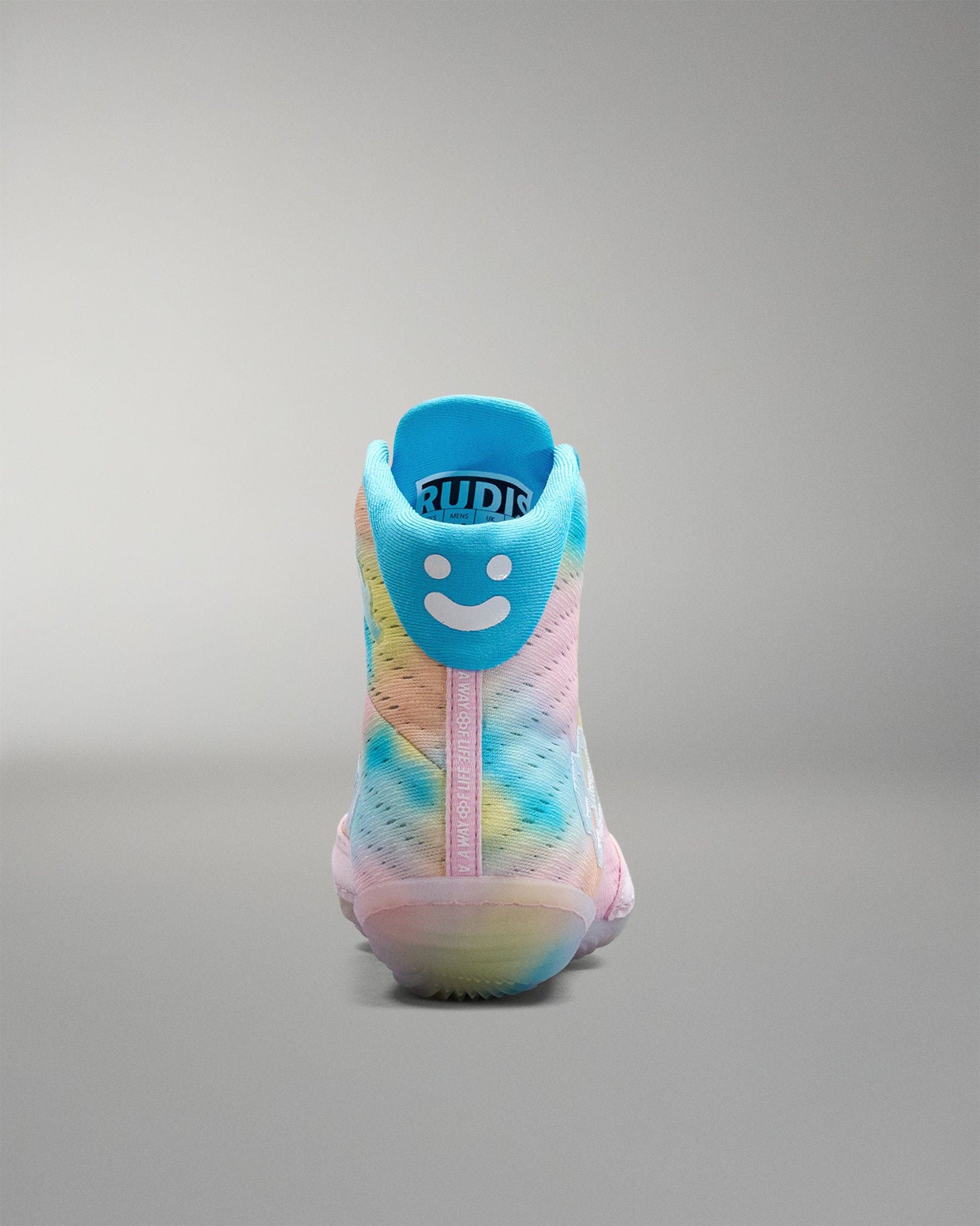 Colorful Wrestling shoe with a smiley face design on a gray background