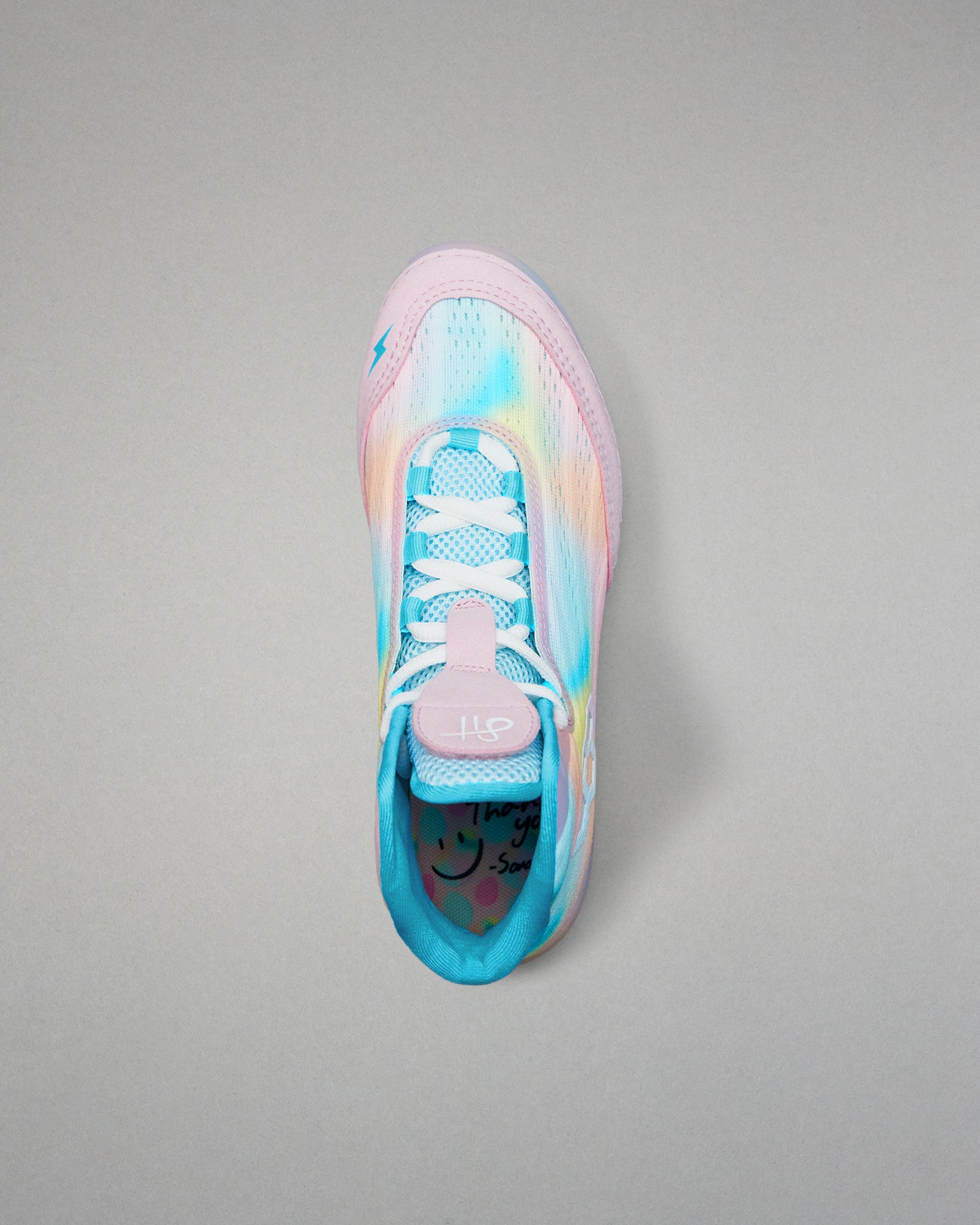 Colorful Wrestling shoe with a gradient design on a gray background