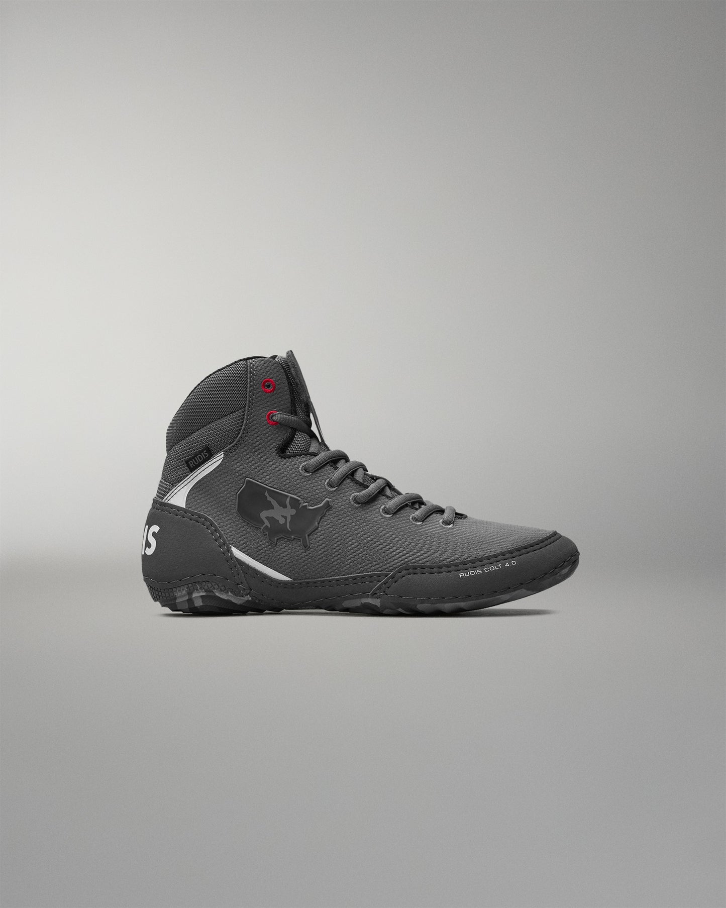 Gray wrestling shoe on a gray background