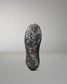 Sole of a wrestling shoe with a 'RUDIS' brand logo on a gray background